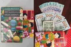 Mượn sách thư viện, nữ sinh lớp 7 phát hiện bao lì xì chứa đô la lastest-news
